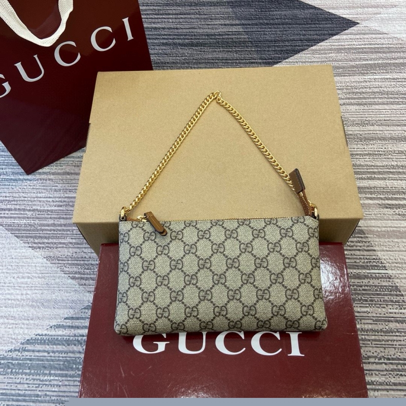 G*u*i top handle bags